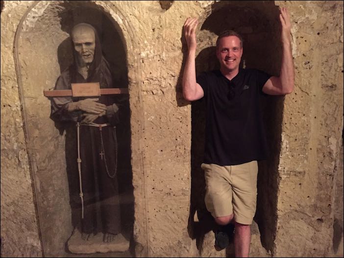 The friars were buried standing up in crypts sealed with glass.